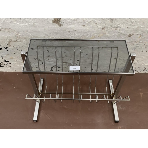 193 - A mid 20th century chrome and smoked glass magazine rack side table - approx. 39cm high x 30cm wide ... 