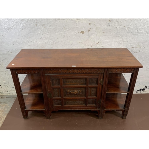202 - A late 19th/early 20th century Oriental carved elm sideboard - approx. 78cm high x 137cm wide x 51cm... 