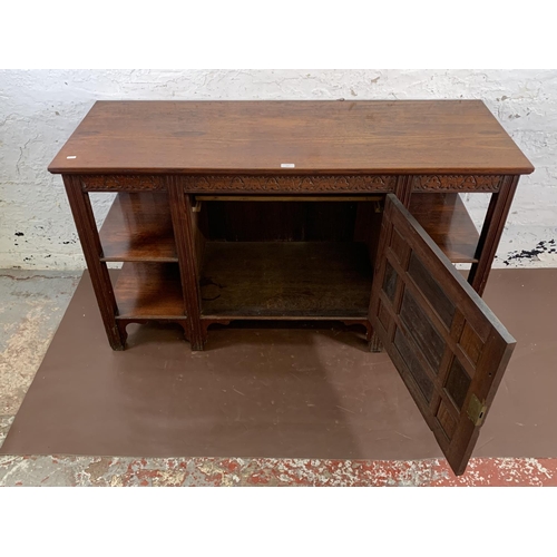 202 - A late 19th/early 20th century Oriental carved elm sideboard - approx. 78cm high x 137cm wide x 51cm... 