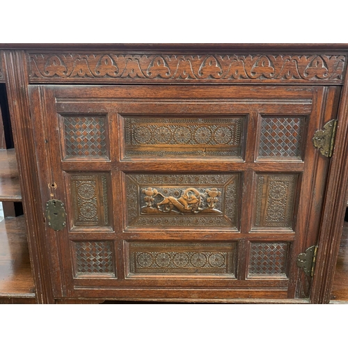 202 - A late 19th/early 20th century Oriental carved elm sideboard - approx. 78cm high x 137cm wide x 51cm... 