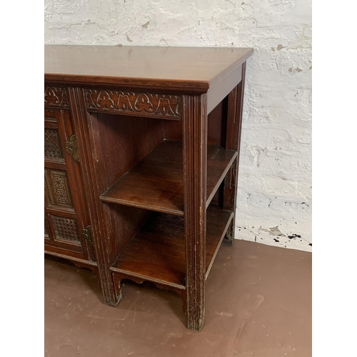 202 - A late 19th/early 20th century Oriental carved elm sideboard - approx. 78cm high x 137cm wide x 51cm... 