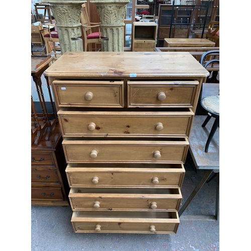 219 - A Victorian style solid pine chest of drawers - approx. 142cm high x 99cm wide x 50cm deep