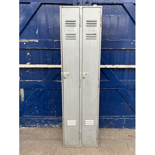 226 - A 1955 Rubery Owen & Co. Ltd. grey painted steel two door locker - approx. 179cm high x 48cm wide x ... 