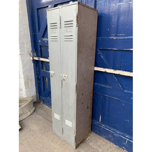 226 - A 1955 Rubery Owen & Co. Ltd. grey painted steel two door locker - approx. 179cm high x 48cm wide x ... 