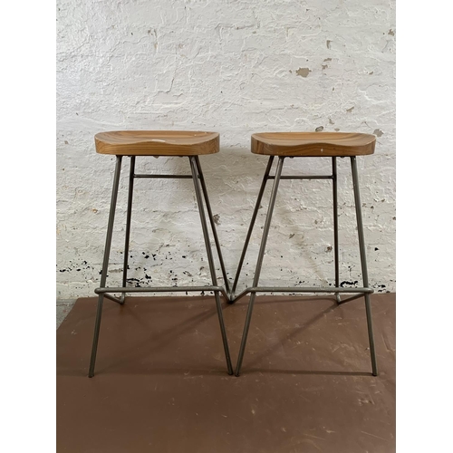 227 - A pair of modern hardwood and tubular metal barstools - approx. 80cm high x 40cm wide x 29cm deep