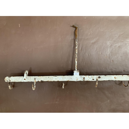 23 - A 19th century wrought iron ten hook ceiling hanging game rack - approx. 214cm wide