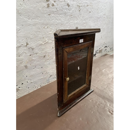 230 - A Georgian style stained wooden wall mountable corner cabinet - approx. 57cm high x 44cm wide x 23cm... 