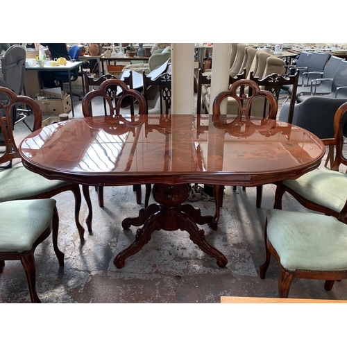 231 - An Italian style inlaid walnut effect pedestal dining table and six chairs - approx. 78cm high x 110... 