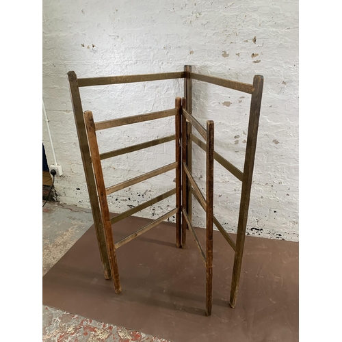 232 - Two early 20th century wooden folding towel rails