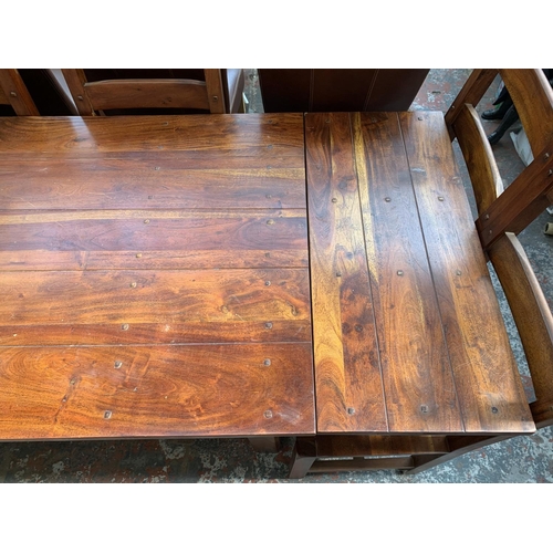 238 - An Indian sheesham wood extendable dining table and six chairs - approx. 76cm high x 90cm wide x 230... 