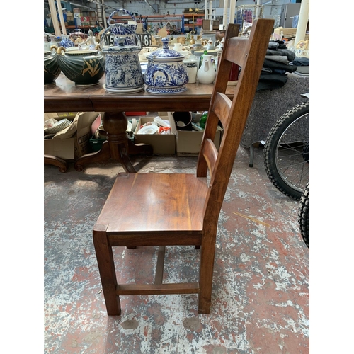 238 - An Indian sheesham wood extendable dining table and six chairs - approx. 76cm high x 90cm wide x 230... 