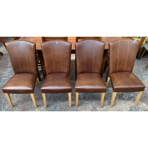 240 - Four modern brown leather dining chairs on oak supports