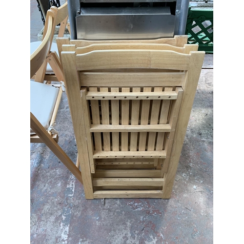 259 - Five beech folding chairs