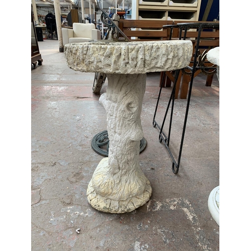 268 - A cast stone tree pedestal bird bath - approx. 66cm high x 40cm diameter