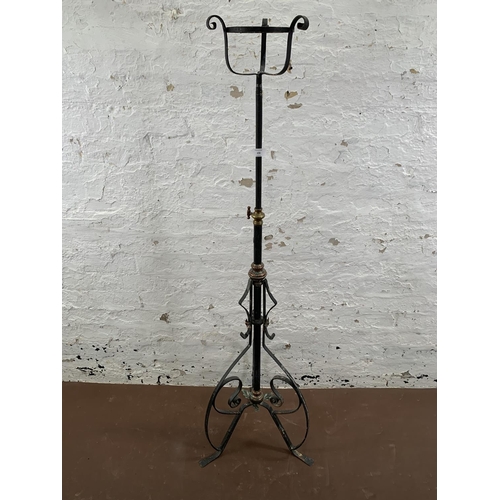 270 - Two wrought metal items, one 19th century telescopic tripod floor lantern - approx. 134cm high and o... 