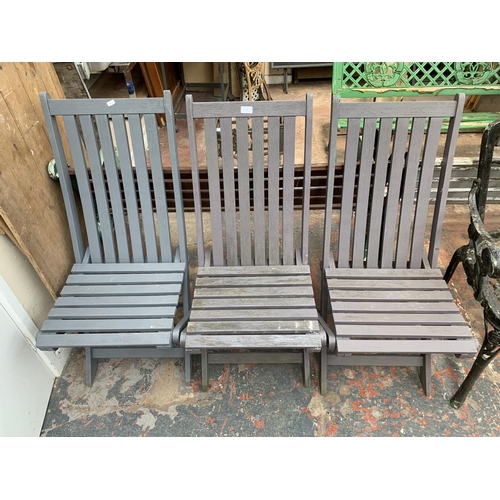 274 - Three painted wooden folding patio chairs