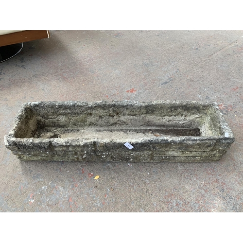 279 - A cast stone garden planter - approx. 18cm high x 90cm wide x 23cm deep