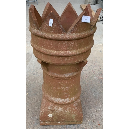 281 - A terracotta crown top chimney pot - approx. 73cm high x 30cm diameter