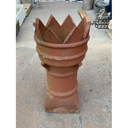 281 - A terracotta crown top chimney pot - approx. 73cm high x 30cm diameter