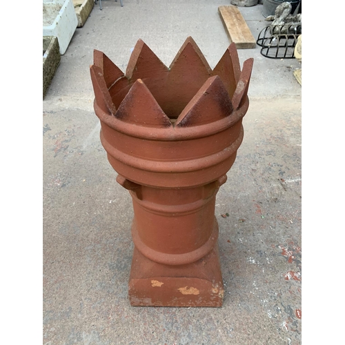 281 - A terracotta crown top chimney pot - approx. 73cm high x 30cm diameter