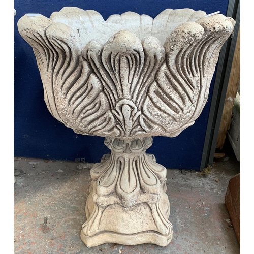 282 - An AJH cast stone tulip urn on plinth garden planter - approx. 62cm high 48cm diameter