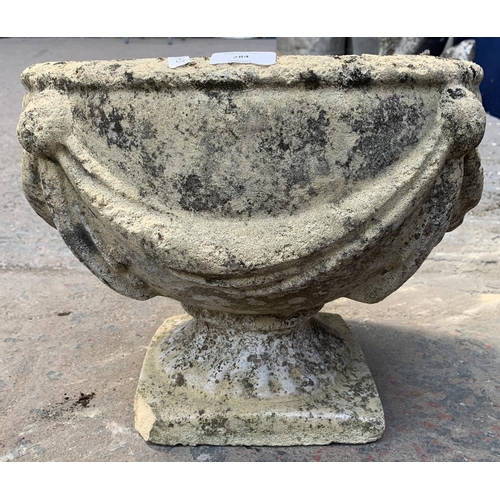 284 - A 19th century style cast stone circular pedestal garden planter - approx. 32cm high x 38cm diameter