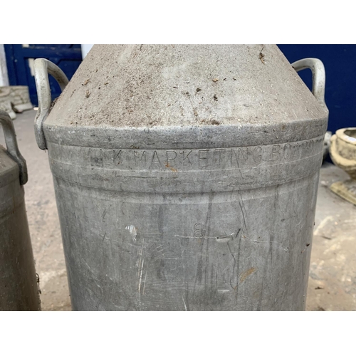 287 - Two galvanised milk churns - largest approx. 90cm high