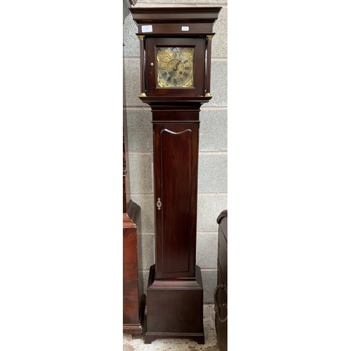 29 - A 19th century style mahogany cased granddaughter clock with brass face, key and pendulum - approx. ... 