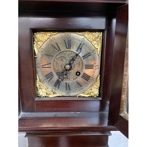 29 - A 19th century style mahogany cased granddaughter clock with brass face, key and pendulum - approx. ... 