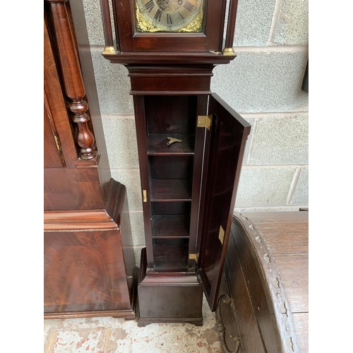29 - A 19th century style mahogany cased granddaughter clock with brass face, key and pendulum - approx. ... 
