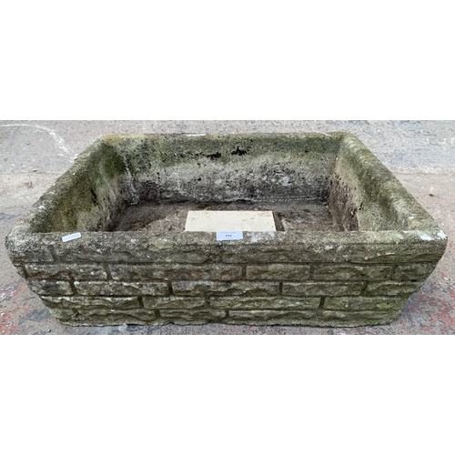 292 - A cast stone rectangular garden planter - approx. 22cm high x 52cm wide x 64cm long