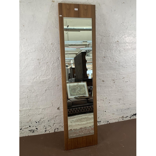 297 - A modern Dwell walnut effect wall mirror - approx. 182cm high x 45cm wide