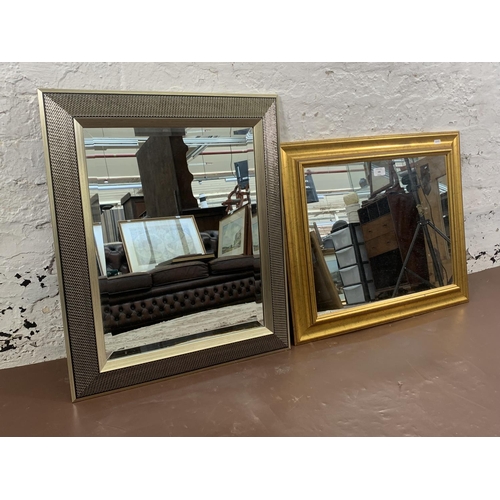 298 - Two modern wall mirrors - largest approx. 67cm high x 54cm wide