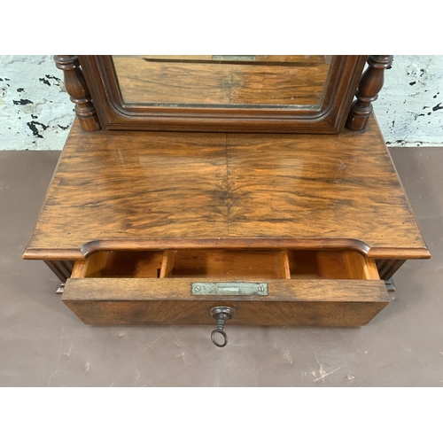 299 - A late 19th century walnut swing dressing table mirror with lower drawer - approx. 61cm high x 42cm ... 