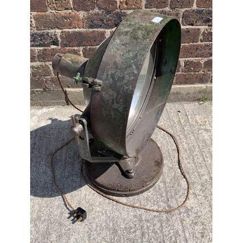 29A - A WWII era green painted steel adjustable and swivel military searchlight - approx. 71cm high x 49cm... 
