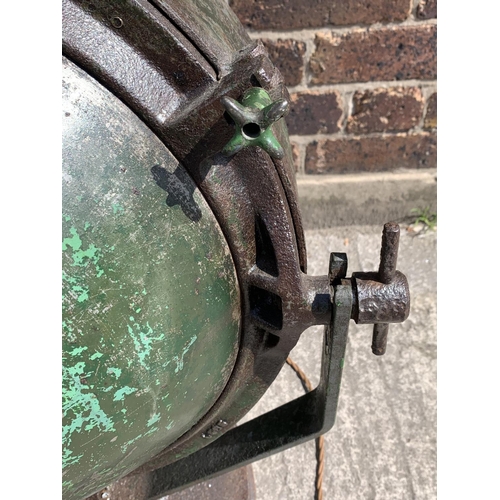 29A - A WWII era green painted steel adjustable and swivel military searchlight - approx. 71cm high x 49cm... 