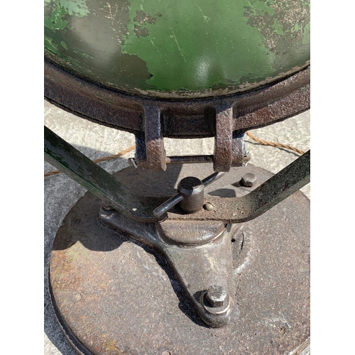 29A - A WWII era green painted steel adjustable and swivel military searchlight - approx. 71cm high x 49cm... 