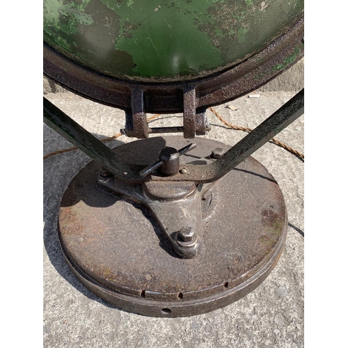 29A - A WWII era green painted steel adjustable and swivel military searchlight - approx. 71cm high x 49cm... 