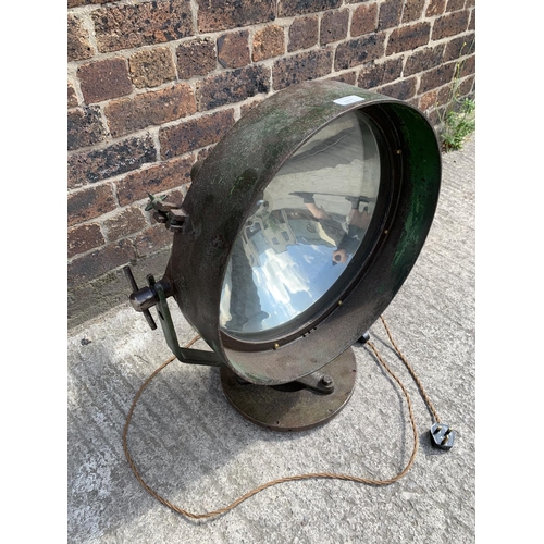 29B - A WWII era green painted steel adjustable and swivel military searchlight - approx. 71cm high x 49cm... 