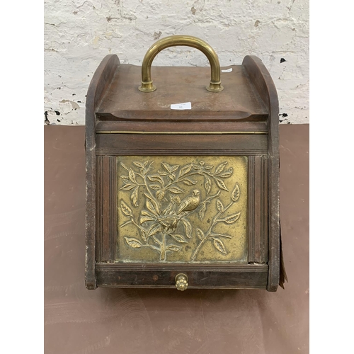 30 - A Victorian walnut and embossed brass coal scuttle with shovel - approx. 35cm high x 34cm wide x 49c... 