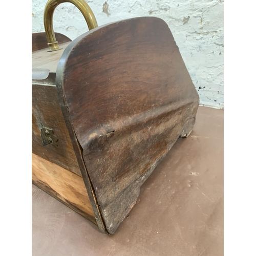 30 - A Victorian walnut and embossed brass coal scuttle with shovel - approx. 35cm high x 34cm wide x 49c... 