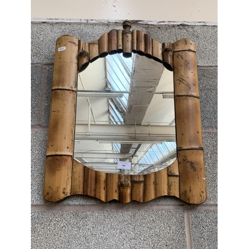 306 - A mid 20th century bamboo framed wall mirror - approx. 59cm high x 45cm wide