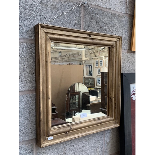 307 - A giltwood framed wall mirror with 19th century mirror plate - approx. 55cm high x 52cm wide