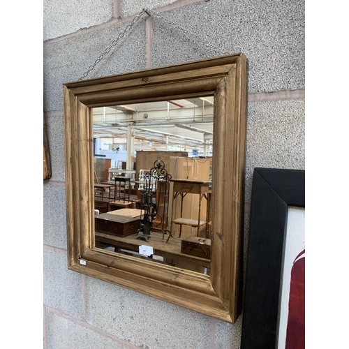 307 - A giltwood framed wall mirror with 19th century mirror plate - approx. 55cm high x 52cm wide