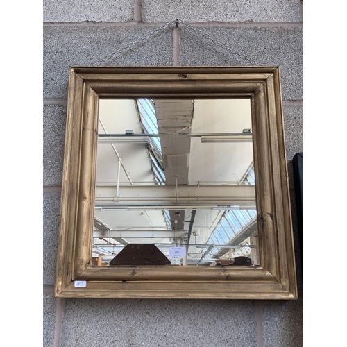 307 - A giltwood framed wall mirror with 19th century mirror plate - approx. 55cm high x 52cm wide