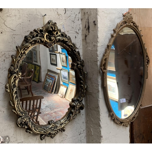 308 - Two 19th century style gilt framed oval wall mirrors - largest approx. 67cm high x 40cm wide