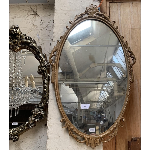 308 - Two 19th century style gilt framed oval wall mirrors - largest approx. 67cm high x 40cm wide