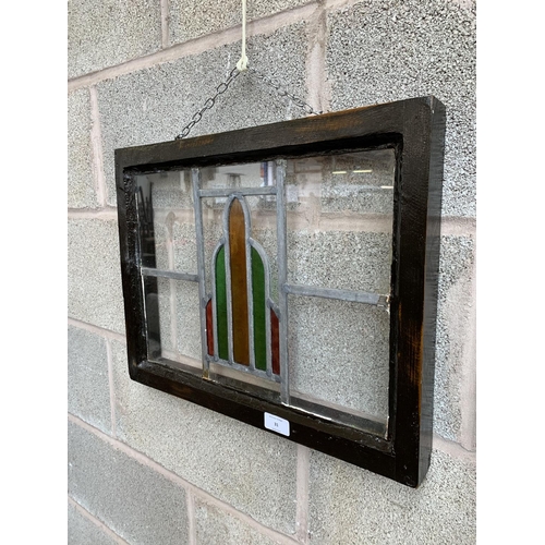 31 - A 1930s wooden framed lead and stained glass window - approx. 38cm high x 49cm wide