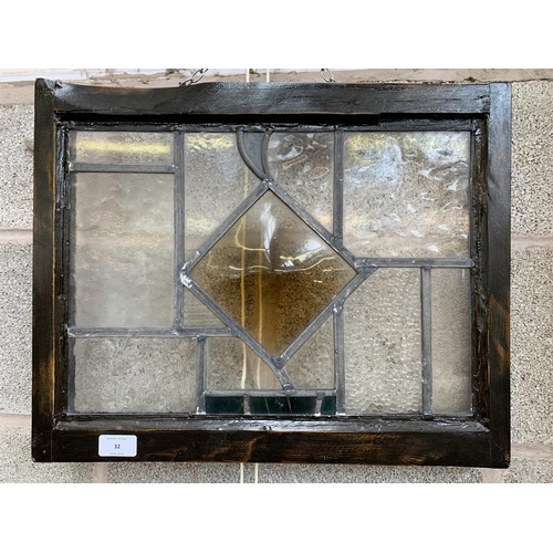 32 - A 1930s wooden framed lead and stained glass window - approx. 39cm high x 49cm wide