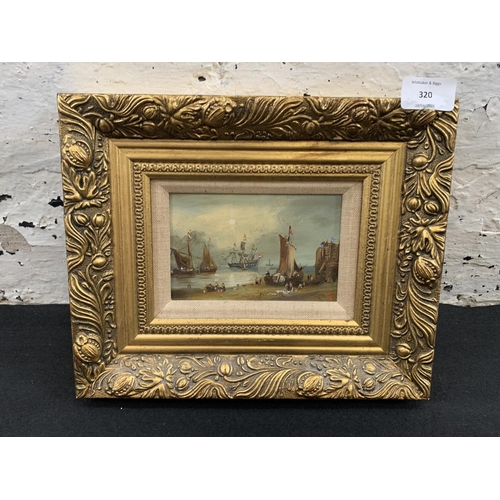 320 - An early 20th century gilt framed oil on board continental seascape, signed lower right - approx. 23... 